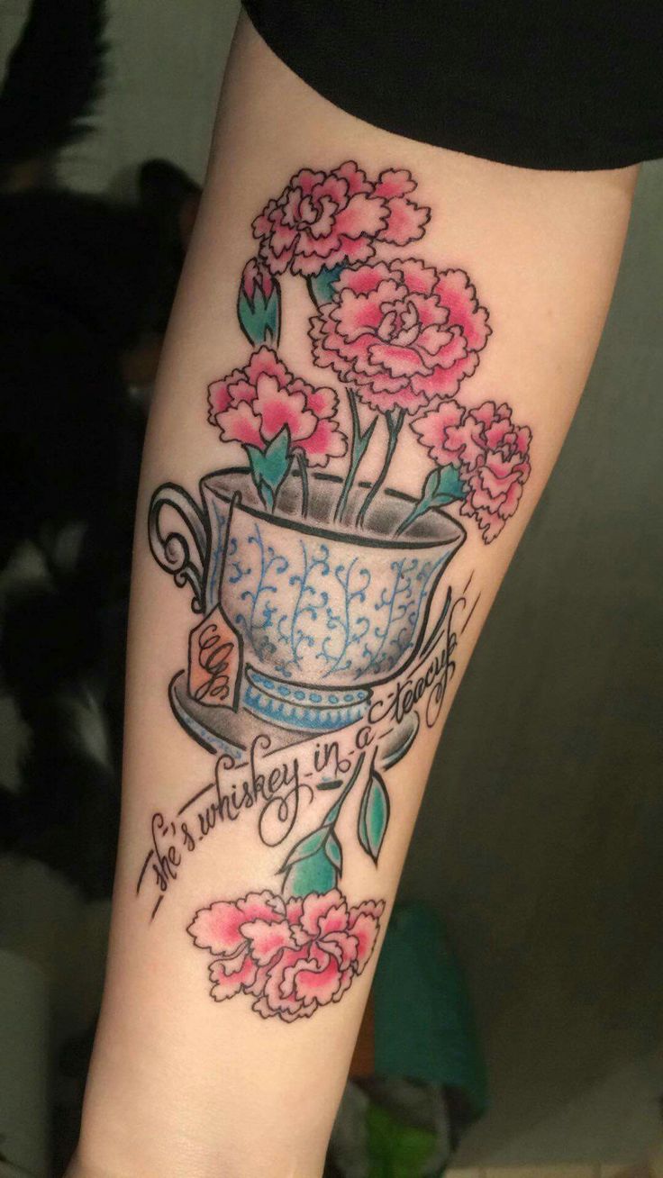 a woman's leg with pink flowers on it and the words, be wonderful in life