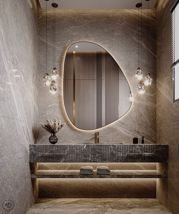 a bathroom with a sink, mirror and lights