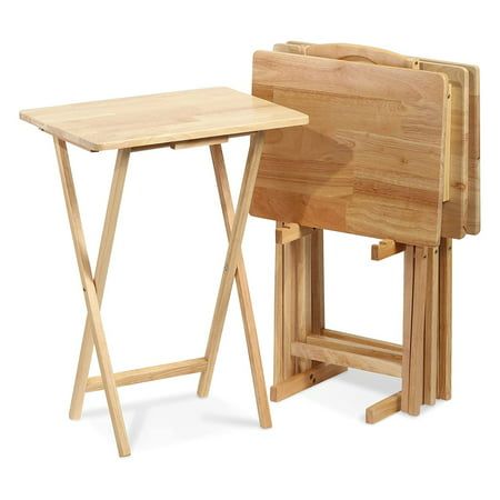 two wooden folding chairs next to each other on a white background with one chair folded up and the other sitting down