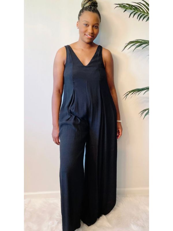 Be effortlessly stylish in our one of a kind V- neck jumpsuit. You’re guaranteed to get tons of compliments. This versatile look can be worn during a casual day event, and for an upscale evening night SLAY! Runs oversized, woven fabric. pictured in small Size Chart Small (sizes: 2-6) Medium (sizes 6-8) Large (sizes 10-12) Chic Strapless V-neck Jumpsuit For Summer, Casual Wide-leg Jumpsuits And Rompers For Party, Casual Wide Leg Jumpsuits And Rompers For Party, Chic V-neck Relaxed Fit Jumpsuits And Rompers, Chic Strapless Overall Jumpsuit For Day Out, Chic Wide-leg Jumpsuits And Rompers For Loungewear, Chic Wide-leg Jumpsuits And Rompers For Day Out, Chic Wide Leg Jumpsuits And Rompers For Day Out, Chic Wide Leg Jumpsuits For Day Out