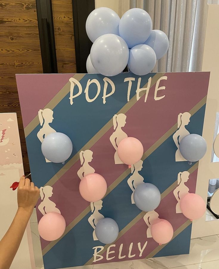 a pop the balloon display at a party