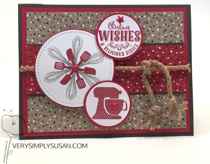 a close up of a greeting card with buttons and bows on the front, in red and white