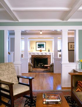 a living room filled with furniture and a fire place