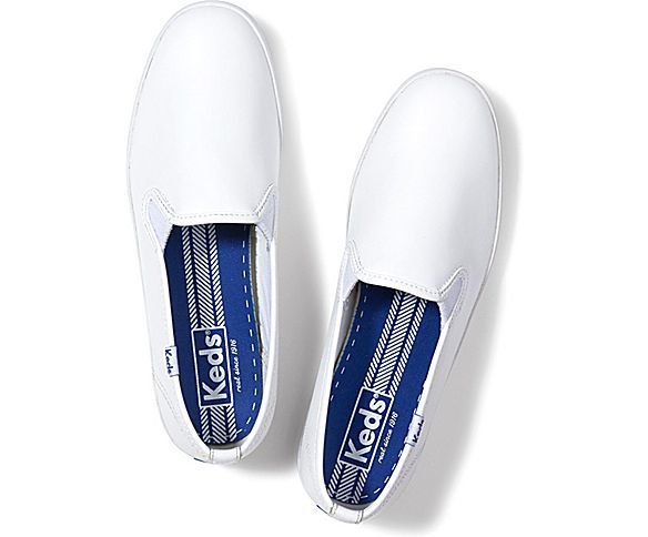 Keds Champion Slip On Leather Casual Leather Slip-ons For Streetwear, Sporty Slip-resistant Slip-ons For Spring, Sporty Slip-ons For Streetwear In Spring, Sporty Spring Slip-ons For Streetwear, Sporty Synthetic Slip-on Sneakers For Everyday, Sporty Slip-on Sneakers With Perforated Toe Box For Everyday, Trendy Low-top Slip-on Sneakers For Everyday, Everyday Spring Low-top Slip-on Sneakers, Spring Everyday Low-top Slip-on Sneakers