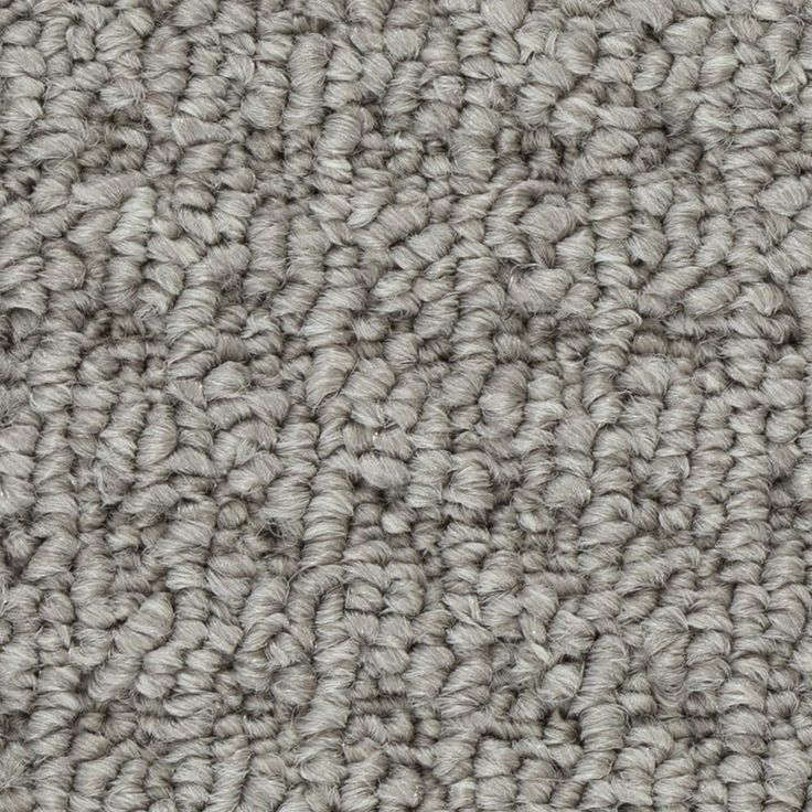 the texture of an upholstered carpet is shown in light gray and white colors