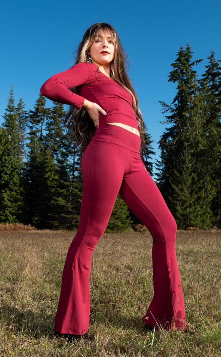 The Slim Bell Pants are the go-to everyday pant aka "the yoga pants." These puppies should be in constant rotation in your closet. We have taken our Flow Pant and toned it down on the flare and turned it up on the fit from hip to knee. Design Features: Wider waistband hits just under belly button Great for every day, dance, movement, hooping and yoga Super soft velvet Made in San Francisco, CA, USA Matching Long Sleeve Bamboo Top. Fabric Features: American Made Bamboo Fabric - Bamboo: 64%, Cotto Fall Yoga Pants With Loosely Fitted Hips, Fall Loungewear Flare Yoga Pants, Athleisure Flare Pants For Loungewear, Flare Yoga Pants For Fall Loungewear, Fall High-waisted Yoga Pants, Fitted Yoga Pants For Fall Loungewear, Fall Yoga Wide-leg Leggings, Fitted Bottoms For Yoga In Fall, Fitted Yoga Bottoms For Fall