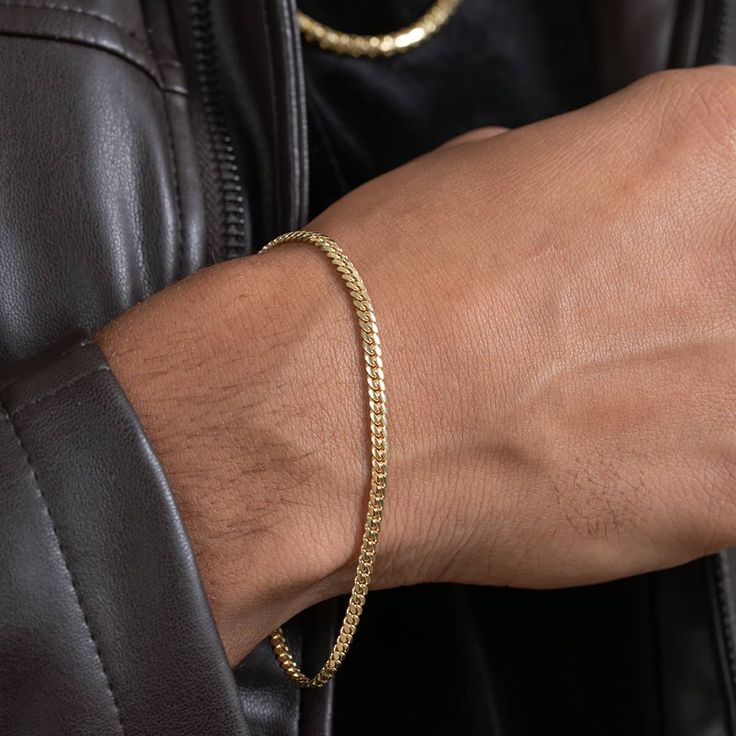 The 3mm-6mm Solid Gold Cuban Link Bracelet is a timeless statement piece that combines bold design with unmatched craftsmanship. Handcrafted from genuine 14K solid gold, this bracelet features the iconic Cuban link design, known for its sleek interlocking structure and polished finish. Available in widths ranging from 3mm to 6mm, this bracelet offers versatile styling options, whether you prefer a subtle accent or a bold statement. The radiant gold finish enhances its luxurious appeal, making it 7mm Cuban Link Bracelet, Men Gold Bracelet, Gold Cuban Link Bracelet, Luxury Jewelry Collection, Cuban Link Bracelet, Miami Cuban Link, Mens Gold Bracelets, Box Clasp, Everyday Accessories