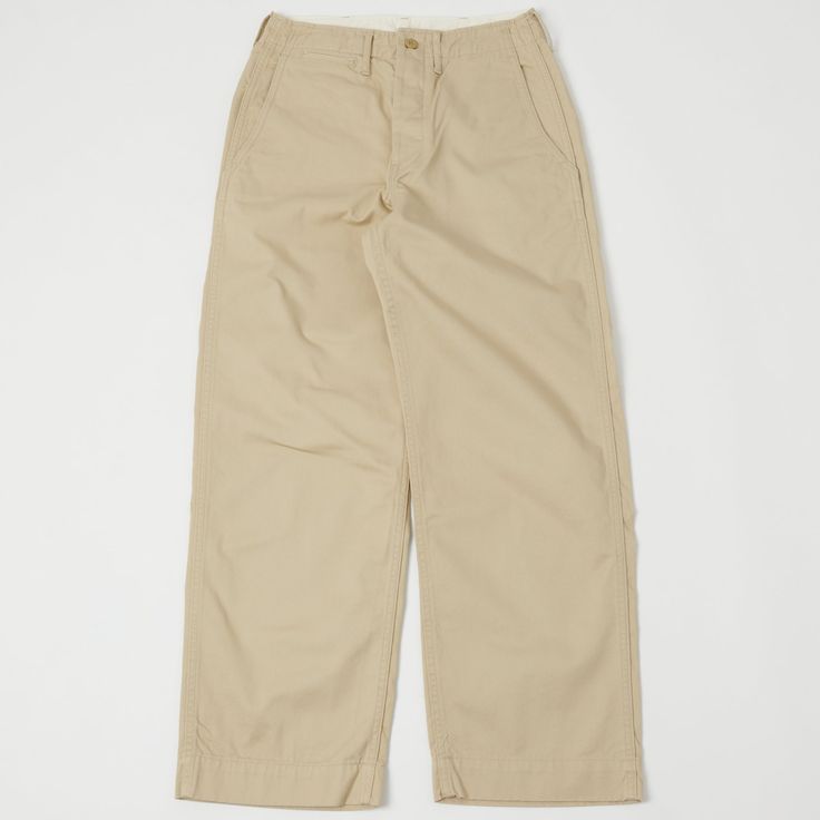 Inspired by the iconic M-41 chino worn by the U.S. Army during WWII, Full Count have released a trouser which really lives up to the brand’s reputation for authenticity and quality. The 1201 chino is a loose fitting trouser with a deep rise which allows for comfort and maximum breathability. Just like the 1941 version these chinos have a flat felled seam on both the inner and outer leg seams and slip watch pocket at the waistband. The 1201 from Full Count is a faithful reproduction of the M-41 w Army Surplus Store, Felled Seam, Flat Felled Seam, Watch Pocket, Army Surplus, Khaki Chinos, Clothing Co, Military Fashion, Khaki Pants