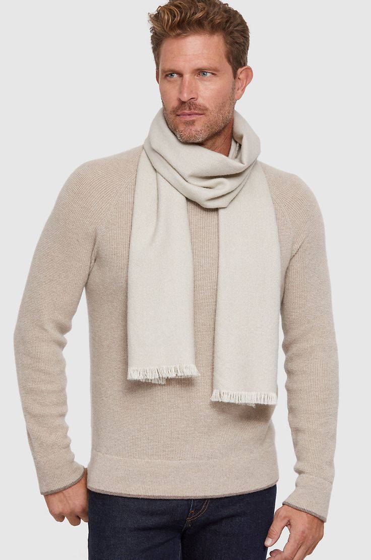 The luxuriant softness of our Alpaca wool scarf will make you smile … or sigh … as you accessorize in style. Featuring a fine two-tone herringbone weave, this subtly textured scarf accented by a short, ivory-colored fringe lends sophisticated appeal to any ensemble. Warm up your winter with a true classic.78" long (including 1.75" fringe, 7/8" each end). Classic Solid Pashmina Shawl, Classic Beige Scarf For Fall, Classic Beige Scarves For Fall, Elegant Beige Wool Scarf, Cream Wool Scarf For Fall, Elegant Solid Color Winter Scarves, Elegant Cream Scarves For Fall, Classic Beige Shawl For Winter, Classic Beige Shawl For Fall