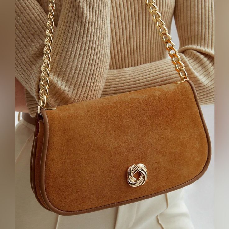 Faux Suede Flap Shoulder Bag With Gold Chain Strap * Color: Rust Brown * Medium Size * Faux Suede Pu Leather * Gold Chain Strap * Bag Height 5.9" Inch (15cm) * Bag Length: 11" Inch (28cm) * Bag Width: 2. Inch (5cm) * Strap Length: 26.4" Inch (67cm) Versatile Brown Shoulder Bag With Chain Strap, Chic Brown Shoulder Bag With Chain Detail, Chic Brown Shoulder Bag With Chain, Brown Workwear Bag With Chain Strap, Gold Chain Strap Shoulder Bag For Work, Trendy Workwear Bags With Chain Strap, Chain Outfit, Elegant High Heels, Chain Strap Bag