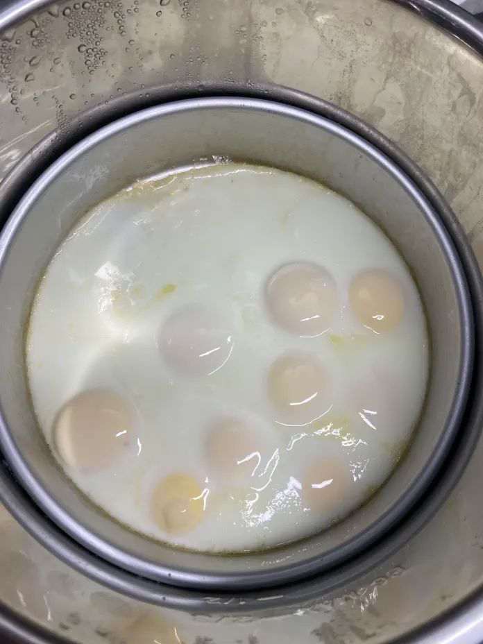 an image of eggs cooking in the pot