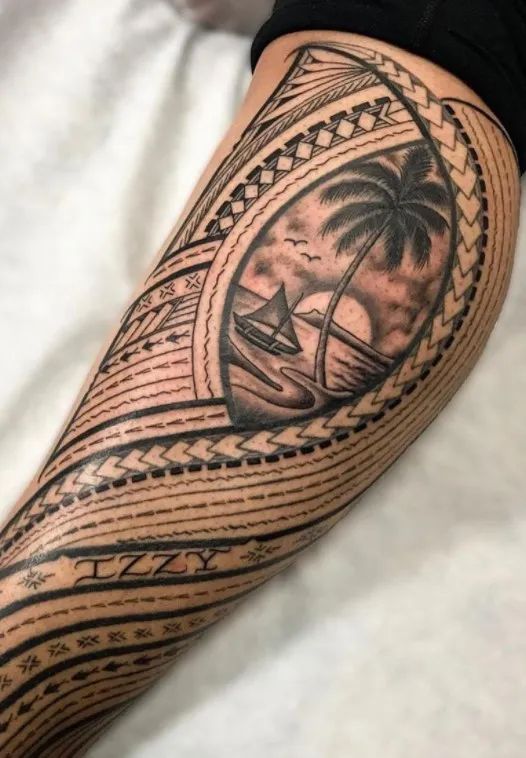 a man with a tattoo on his arm that has a boat and palm trees in it