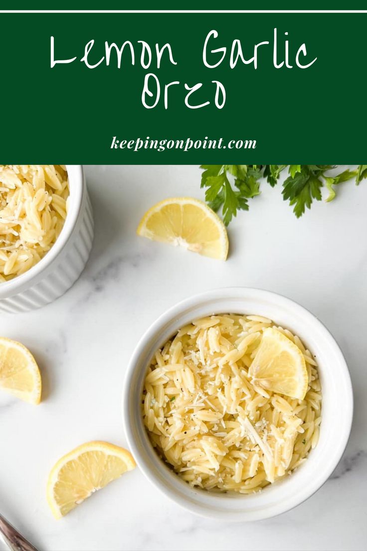 two bowls filled with lemon garlic pasta and garnished with parsley