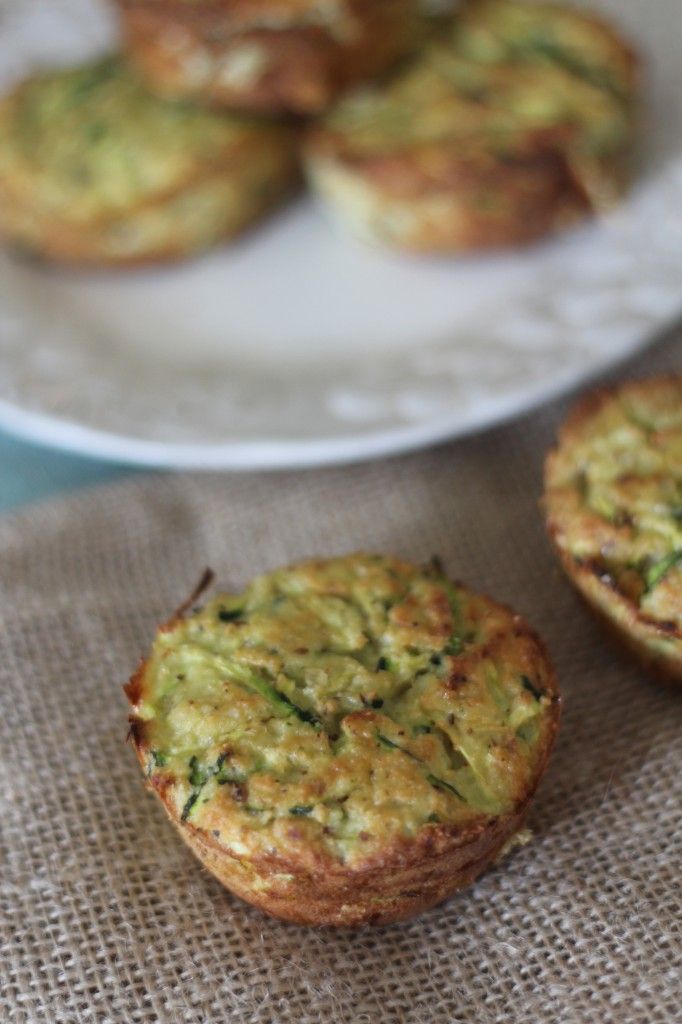 three muffins sitting on top of a white plate