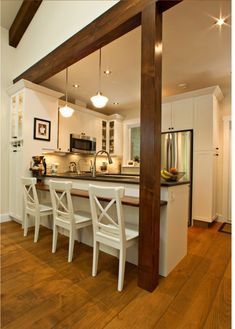 the kitchen is clean and ready to be used for cooking, dining or as an appliance