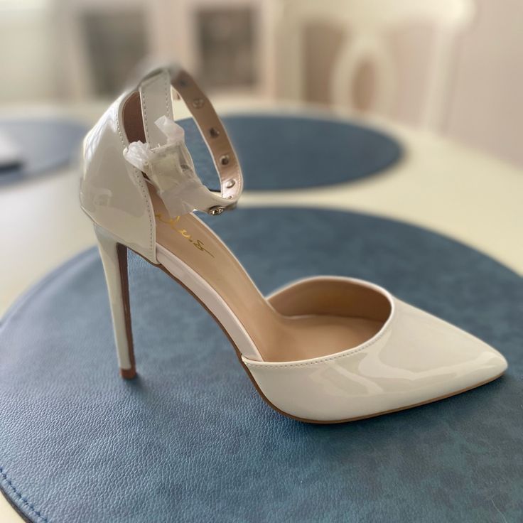 Size 7 Brand New Lulus Heels Perfect For Bridal Shower, Bachelorette, Rehearsal Dinner, Or Wedding Day White Fitted Heels For Wedding Guest, Elegant Ankle Strap Heels For Brides, Elegant Bridal Heels With Ankle Strap, Elegant High Heel Bridal Shoes, Elegant High Heel Bridal Heels, Elegant Open Toe Heels For Bride, Elegant Cream Heels For Bride, Elegant High Heels For Bride, Lulus Heels