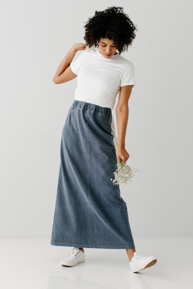 With the look of real denim but the feel of a quality knit, comfort is the key element in our exclusively designed Caroline skirt. The quick, pull on style makes this skirt an effortless option for wherever your day might take you - running errands, making dinner, playing with the kids, or a quick trip to the coffee shop to grab your favorite latte. Soft, comfortable knit denim fabric 65% Cotton 30% Polyester 5% Spandex Heather Grey & Deep Chambray 70% Rayon 25% Polyester 5% Spandex Hand Wash Co Casual Stretch Dark Wash Skirt, Relaxed Denim Skirt With Elastic Waistband, Relaxed Fit Denim Skirt With Elastic Waistband, Denim Skirt With Elastic Waistband, Relaxed Fit, Fall Stretch Medium Wash Skirt, Casual Dark Wash Skirt For Everyday, Stretch Cotton Dark Wash Denim Skirt, Casual Medium Wash Denim Skirt With Elastic Waistband, Casual Dark Wash Relaxed Fit Skirt