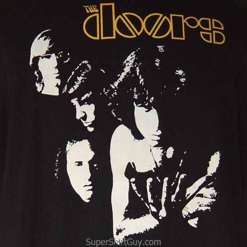 the doors t - shirt in black and white with yellow print on front, featuring three young men