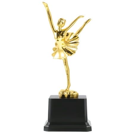 a gold figurine with a ballerina on it's arm and legs