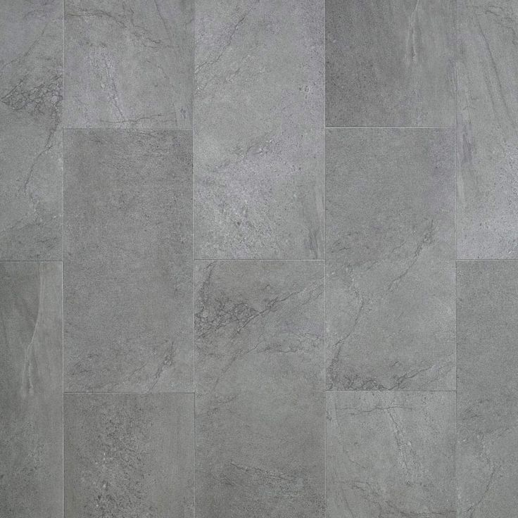 a tile floor with grey and white colors