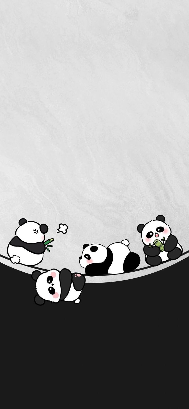 a group of panda bears sitting on top of a black and white wall