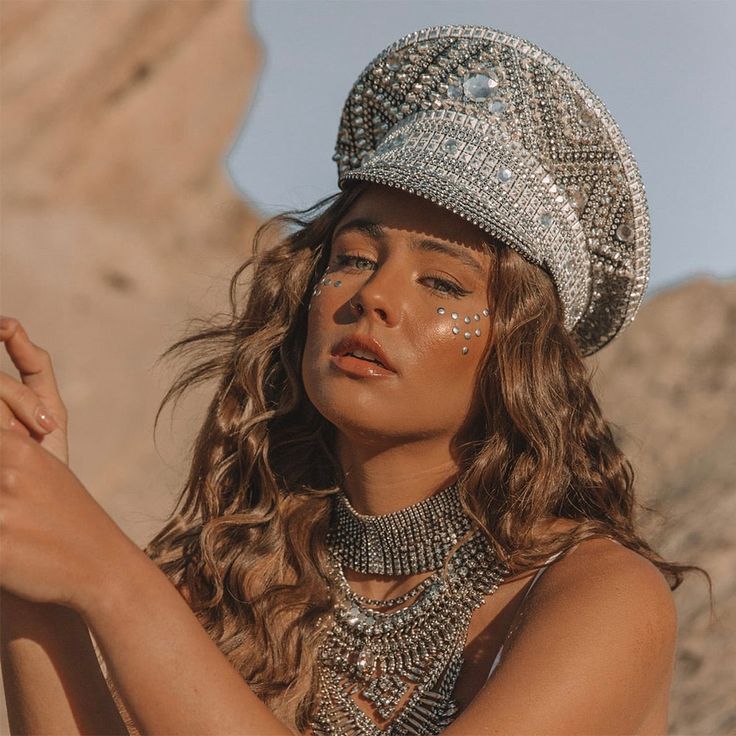 Elevate your playa-inspired look with our Rhinestone Handmade Festival Military Hat! Available in both silver and gold colors, this stylish accessory merges edgy military vibes with festival flair, adding the perfect touch to your Coachella Chic outfit or your Burning Man ensemble. Handcrafted with intricate rhinestone detailing, this hat exudes sparkle and personality, ensuring you stand out in the desert crowd. Whether you're dancing under the stars or exploring the art installations, this hat Burning Man Hat, 70s Glam Rock Fashion, Coachella Chic, Bachelor's Party, 70s Glam Rock, Women Steampunk, Captain Cap, Festival Fits, Sequin Hat