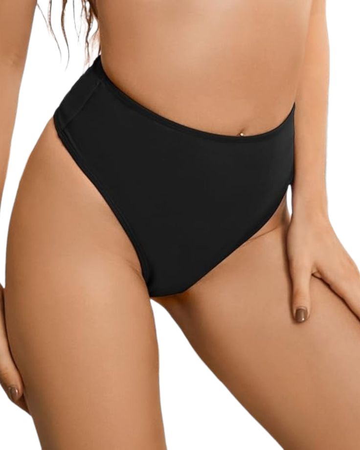 Introducing the ultimate staple for your rave outfit collection - the High Waisted Thong in classic black. Designed to offer both style and comfort, this handmade piece is a must-have for any festival-goer. With its sleek, high-rise fit, this thong accentuates your curves while providing extra cheeky coverage that's perfect for dancing the night away. High waist for a flattering fit Thong style with extra cheeky coverage High on the hips to elongate the legs Reaches navel height for ultimate com Black Stretch Swimwear For Music Festival, Fitted Black Swimwear For Music Festival, Summer High-cut Leg Swimwear With Boning, High-cut Leg Swimwear With Boning For Summer, Black Rave Swimwear For Festivals, Black High-cut Leg Swimwear For Summer, Solid High Cut Swimwear With Boning, Solid High-cut Swimwear With Boning, Black Stretch Rave Swimwear