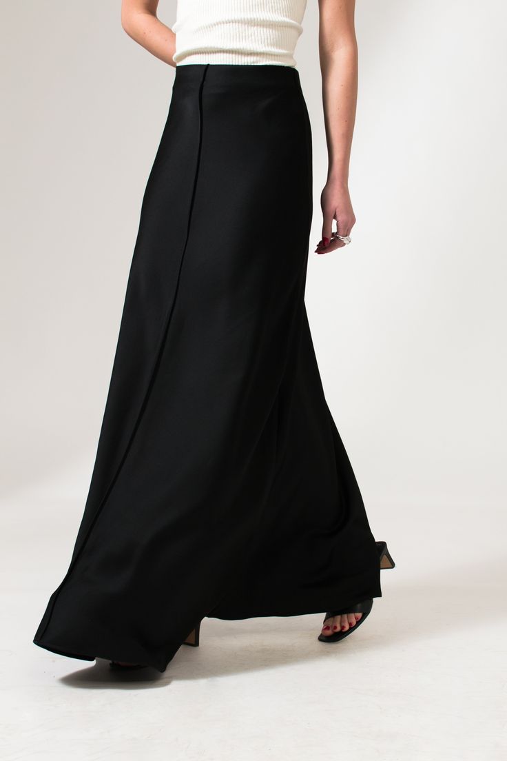 Black Satin Silk Maxi Slip On Skirt - Custom Made - Bastet Noir Elegant Satin Maxi Skirt For Work, Satin Lined Maxi Skirt For Work, Satin Lined Workwear Maxi Skirt, Satin Maxi Skirt For Workwear, Sleek Flared Maxi Skirt For Evening, Sleek Long Maxi Skirt For Spring, Sleek Relaxed Maxi Skirt, Sleek Long Lined Skirt, Formal Silk Maxi Dress With Flowy Skirt