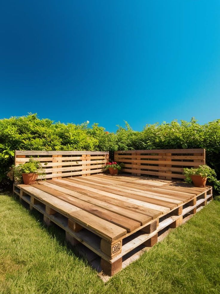 a wooden deck in the middle of some grass