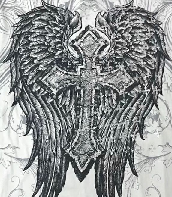 the back of a t - shirt with an angel cross and wings drawn on it