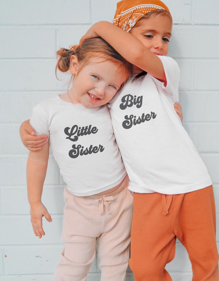 Uplift any child's wardrobe with a custom kid's t-shirt. The Bella Canvas short sleeve tee for toddlers is a 100% Airlume combed and ring-spun cotton jersey with a tear-away label for extra comfort. Choose your favorite color out of a big variety, and make unique staples that toddlers will happily wear every day.  .: 100% Airlume combed and ringspun cotton (fiber content may vary for different colors) .: Extra light fabric (3.9 oz/yd² (132 g/m .: Tear-away label Personalized Cute Crew Neck T-shirt, Personalized Unisex Short Sleeve T-shirt, Basic Personalized Cotton Tops, Cute Personalized White T-shirt, Personalized Matching Crew Neck T-shirt, Personalized Unisex Crew Neck Tops, Personalized Cotton Short Sleeve Tops, Family Matching Unisex T-shirt With Name Print, Unisex Matching Crew Neck T-shirt