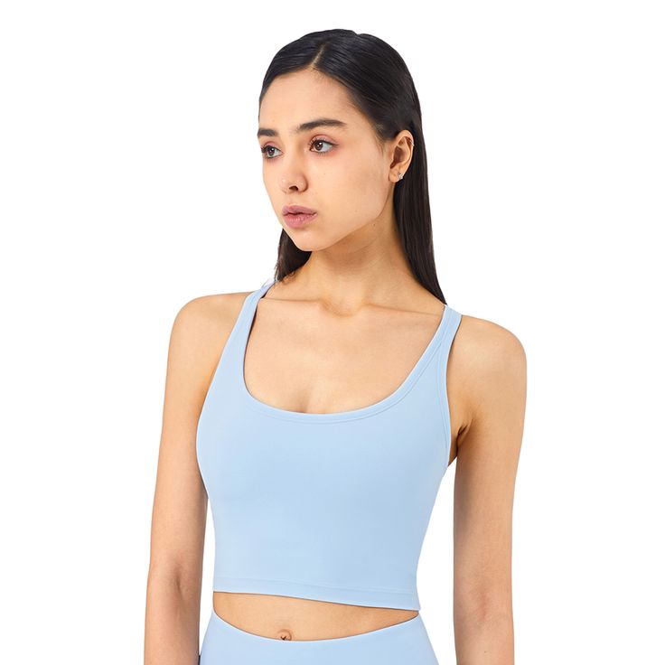 Light Blue Sportswear Push-up Tank Bra Blue Sleeveless Activewear With Medium Support, Light Blue Sporty Moisture-wicking Top, Sporty Light Blue Moisture-wicking Tops, Functional Sleeveless Blue Activewear, Sporty Blue Sports Bra For Pilates, Blue Sleeveless Athleisure Activewear, High Stretch Blue Sportswear Tops, Blue High Stretch Sportswear Top, Sporty High Stretch Blue Sports Bra