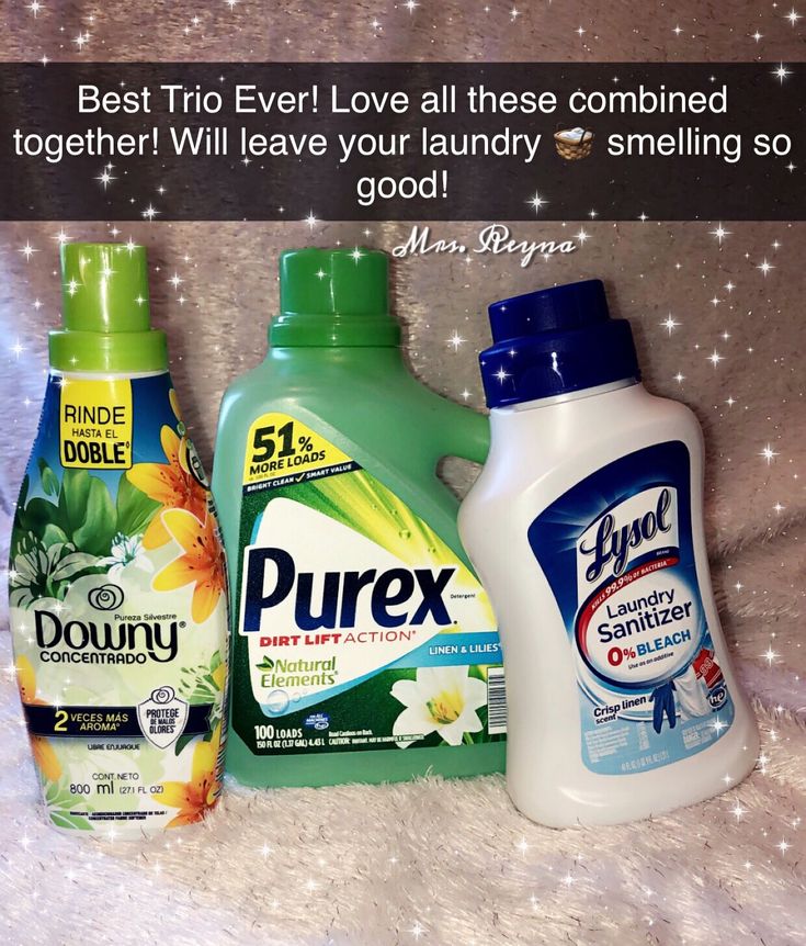 three bottles of purex on a bed with sparkles in the background and an advertise that says, best trio ever love all these combined together will leave your laundry smiling so good