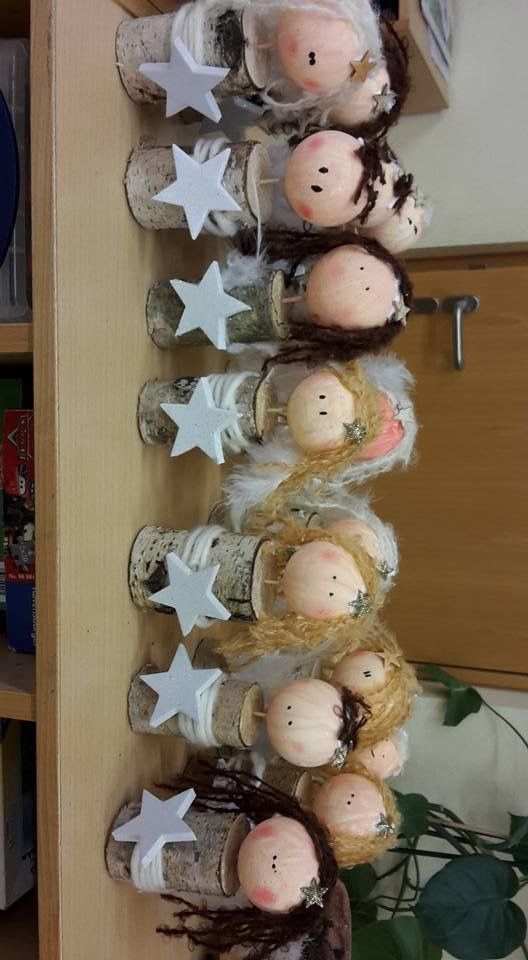 a shelf filled with dolls and stars on top of it