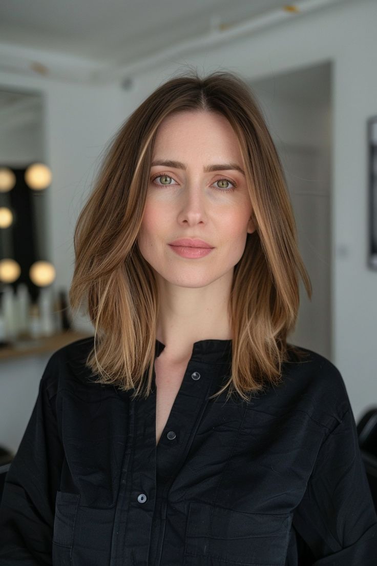 Elegant shoulder-length cut with soft layers. Medium Length Haircut Soft Layers, Straight Hair Medium Length Haircuts, Best Air Dry Haircuts, Medium Length Haircut Middle Part, Shoulder Length Hair Face Framing Layers, Medium Length Haircuts For Fine Hair, Straight Shoulder Length Hair With Layers, Layered Collar Bone Length Hair, Hair Shoulder Length