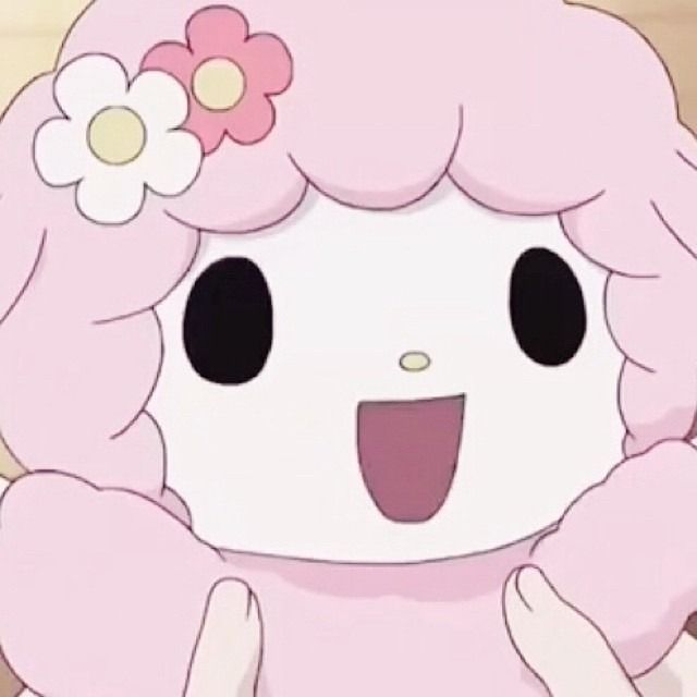 a cartoon character with pink hair and flowers in her hair, smiling at the camera