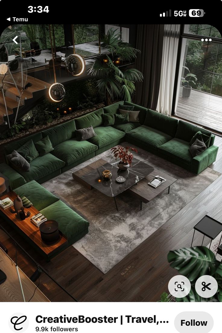 a living room filled with lots of green furniture