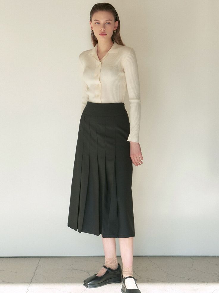 Editor's Notes This pleats skirt in midi length falls around mid-calves with high waist line addressing long leg line. The knife pleats are stitched down expressing classic sophisticated mood. This basic item can be mix matched with casual tops or shirts creating multiple styles.- Blended fabric with high durability- Drapery texture giving soft touch- Classic knife pleats stitched down- High waisted addressing long leg line- Elastic waist band at back waist- Invisible zipper closure on side seamMeasurements(in.)One size- Waist: 12.60 in.- Hip: 16.93 in.- Hem: 35.43 in.- Total Length: 31.10 in.* Model info: Height 5' 7 / Bust 31.5 in. / Waist 23.6 in. / Hip 33.5 in.Composition & Care- 80% Polyester, 16% Rayon, 4% Spandex- Dry cleanDesigner- by NICK&NICOLE Pleated Wide Leg Culottes For Fall, Pleated Midi-length Workwear Bottoms, Workwear Midi Bottoms With Folds, Midi-length Workwear Bottoms With Folds, Midi Length Bottoms With Folds For Work, Classic Fitted Pleated Skirt For Business Casual, Classic Pleated Skirt For Fall, Fitted Midi Pleated Skirt With Accordion Pleats, Workwear Midi Skirt With Folds