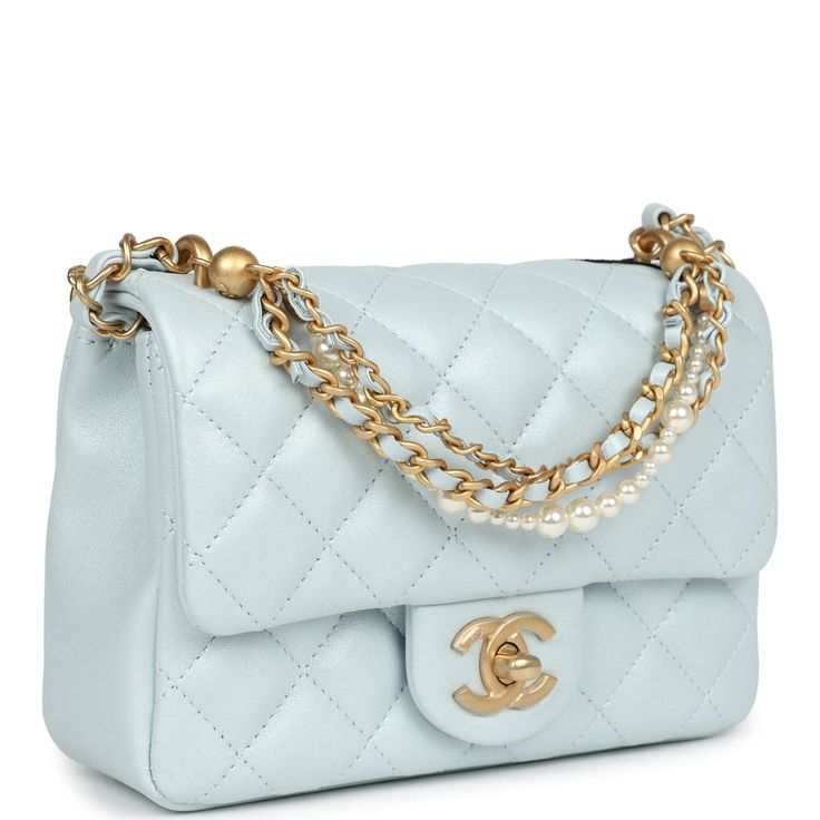 Chanel Mini Square Pearl Flap Bag Light Blue Iridescent Lambskin Brush – Madison Avenue Couture Chanel Blue Bag, Blue Chanel Bag, Chanel Mini Square, Light Blue Fashion, Blue Handbag, Luxury Bags Collection, Chanel Box, Chanel Pearls, Chanel Flap Bag