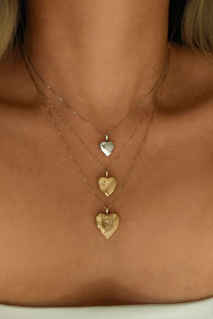 DESCRIPTIONWe heard you, white gold lovers! Get the silver look but without the tarnishing!A white gold sweet heart locket is placed on our 0.5mm Box Chain, with lots of love and nostalgia, too. Locket holds up to 2 images so be sure to include your bestie, lover, dog, or yourself...we won't judge <3 DETAILS - always made in 14k white gold- pendant measurement: 13mm x 12mm- model wears a 16” Dainty Silver Heart Locket Necklace, Dainty Heart-shaped Sterling Silver Locket Necklace, Dainty Heart-shaped Silver Locket Necklace, Dainty White Gold Locket Necklace, Double Heart Locket Necklace In White Gold, Silver Dainty Locket Necklace With Initial Pendant, Silver Dainty Initial Pendant Locket Necklace, Dainty Silver Initial Pendant Locket Necklace, Double Heart White Gold Locket Necklace