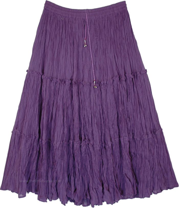 A fully flared festival skirt in a crinkled purple cotton fabric with half lining.  This tiered skirt is comfy and fashionable with its elastic waist and ethnic dori. #tlb #Crinkle #MaxiSkirt #Peasant #Dance #PurpleSkirt #CottonMidiSkirt Purple Skirts For Women, Purple Skirt Long, Purple And Green Outfits, Casual Purple Flowy Skirt, Purple Long Skirt, Purple Relaxed Flared Skirt, Purple Clothes Aesthetic, Purple Flowy Full Skirt, Purple Flowy Tiered Maxi Skirt