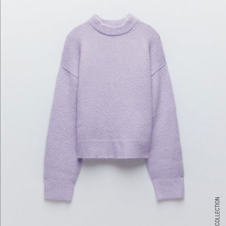 Relaxed Crop Sweater With Rib Trim. New With Tags Lavender Knit Sweater For Fall, Lavender Crew Neck Sweater For Fall, Winter Soft Knit Purple Tops, Purple Soft Knit Winter Top, Winter Purple Soft Knit Tops, Purple Knit Crew Neck Sweater, Purple Crew Neck Knit Sweater, Purple Textured Knit Sweater For Fall, Trendy Purple Soft Knit Sweater