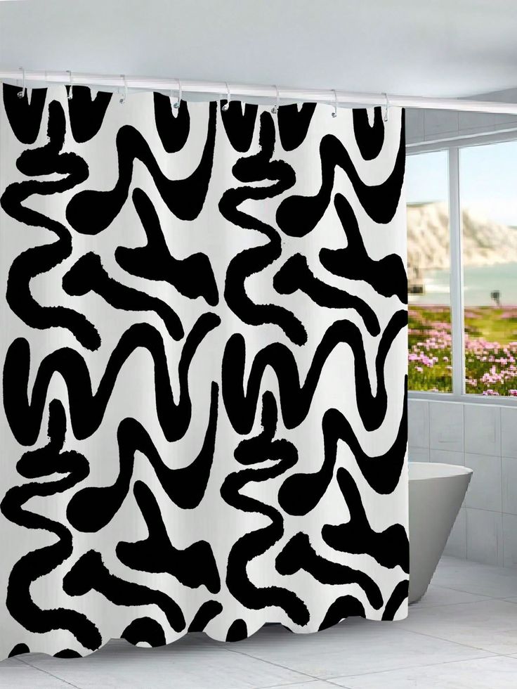 a black and white shower curtain with an abstract design in the middle, next to a bathtub