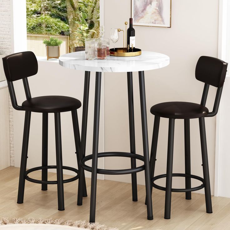 two stools and a table in a room