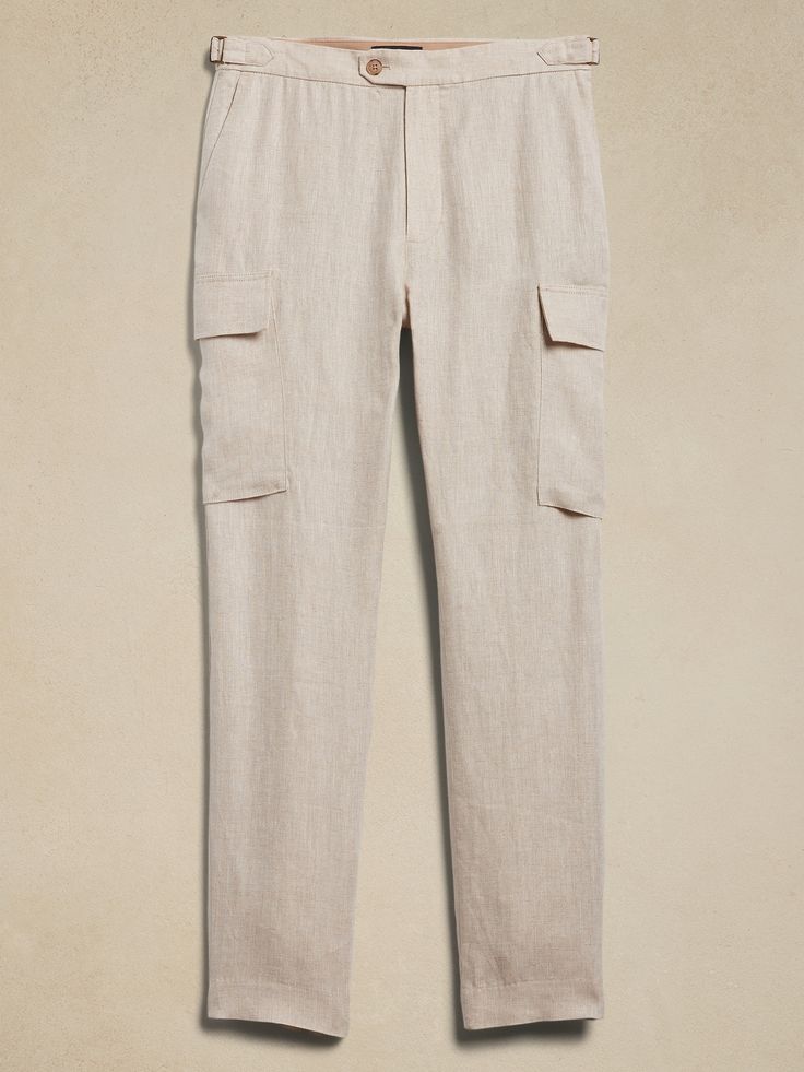 We reinterpreted the classic cargo pant with the details of an expertly tailored trouser and side adjuster tabs at the waist for a perfect fit.  For fabric, we reached for certified European linen, a fabric we love for its lived-in look and its ability to stay cool and crisp even in heat and humidity.  Tailored Slim Fit: Mid-rise.  Tapered slim leg.  Zip fly with button-tab closure.  Front, back and side cargo pockets.  Trouser crease.  Unlined.  Tailored Slim Fit: Mid-rise.  Tapered slim leg.  Full length.  Inseams: Regular 31. 5" Model: Size 32 Regular, 6'2" (188cm). European Linens, Cargo Pant, Slim Leg, Stay Cool, Slim Legs, First Look, Mid Rise, Full Length, Cashmere