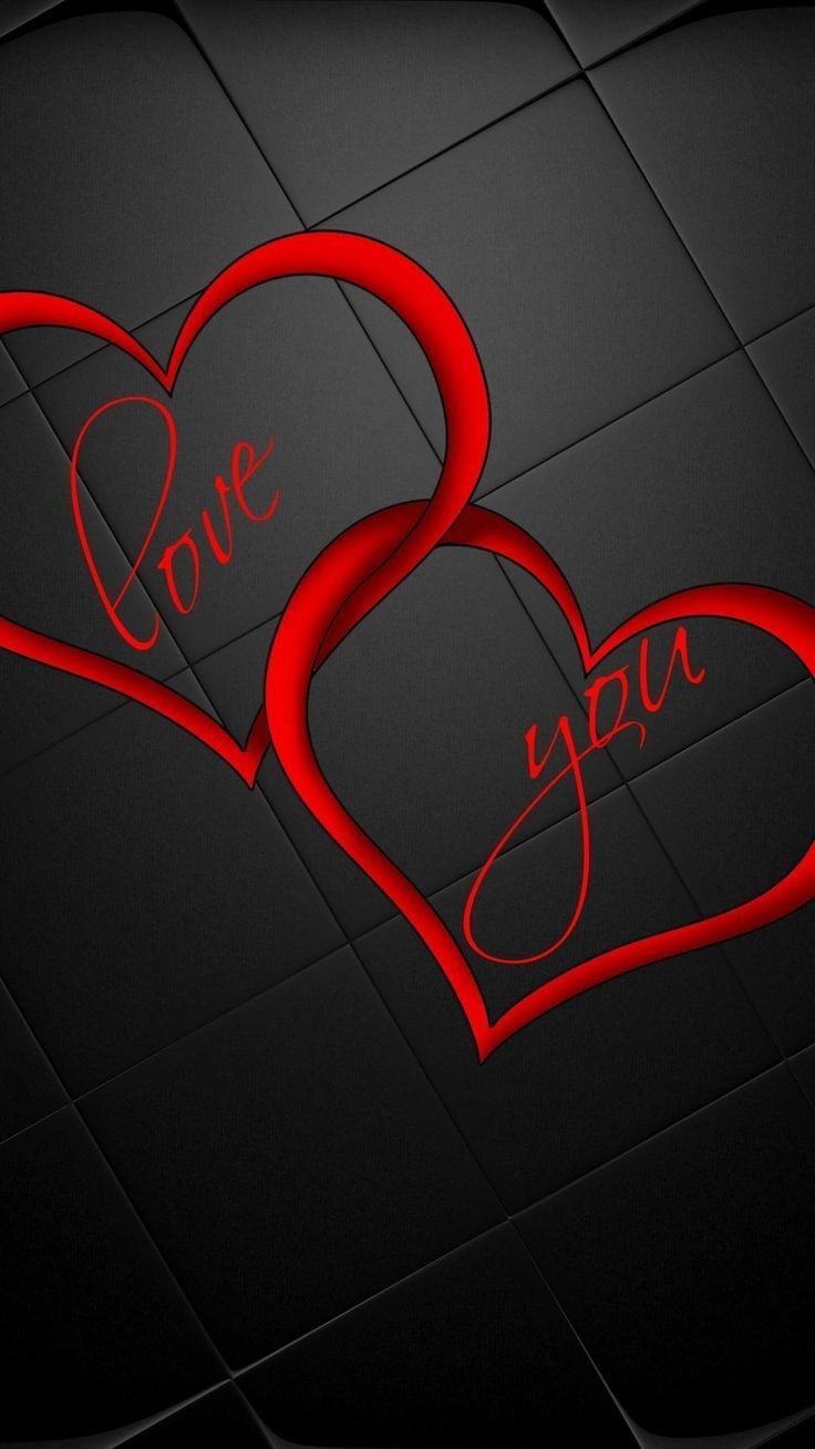 two red hearts with the words love you written on them in cursive writing