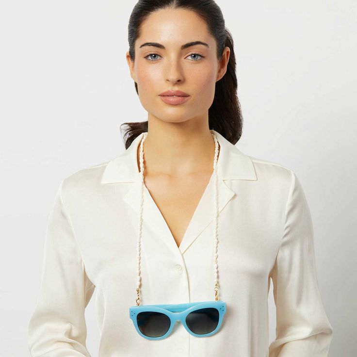 Take your sunglasses to the next level in fashion and function with an elevated chain to keep your shades secure - and looking stylish. The small white shells evoke luxurious beaches and sea salt-kissed air, adding an extra element of style to your look. To use, simply attach your new chain to the temples of your sunglasses. White Shells, Elements Of Style, Sea Salt, In Fashion, Next Level, Shells, Salt, The Next, Shades