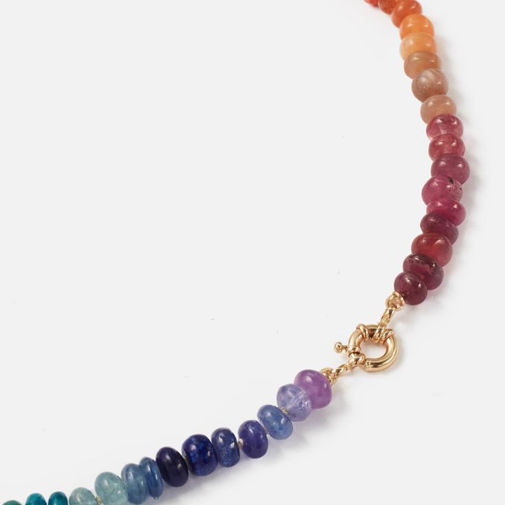 The Encirkled Small Classic Rainbow Beaded Necklace is a cult favorite and the ultimate addition to your neck stack. It features bright-colored rainbow gemstones and a 14k spring ring closure that is perfect for displaying your favorite charms. Assorted gemstones that may include amethyst, apatite, aquamarine, carnelian, citrine, chocolate moonstone, chrysoprase, Ethiopian opal, fire opal, garnet, grandidierite, kyanite, lapis lazuli, lemon quartz, peach moonstone, peridot, rhodochrosite, ruby, Multicolor Gemstone Rondelle Jewelry, Multicolor Rondelle Single Strand Jewelry, Multicolor Single Strand Round Jewelry, Multicolor Rondelle Gemstone Beads Jewelry, Multicolor Single Strand Rondelle Jewelry, Multicolor Polished Rondelle Beads Jewelry, Rainbow Round Single Strand Jewelry, Rainbow Colored Single Strand Round Jewelry, Rainbow Rondelle Gemstone Bead Necklaces