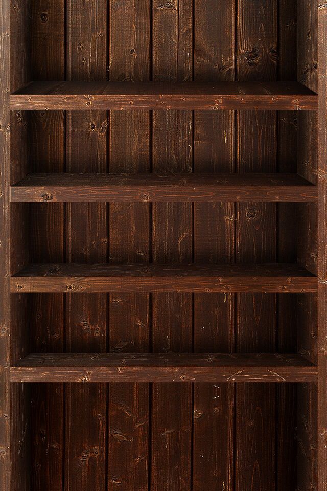 an old wooden bookcase with three shelves