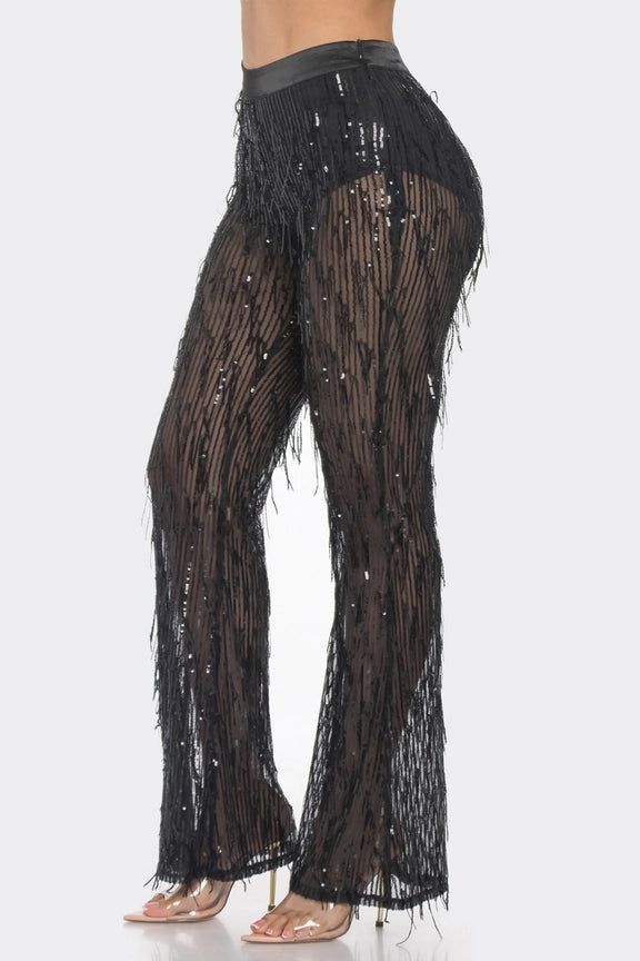 Get the party started with these shimmering sequin pants! Layer up in style with an edgy mesh layer, plus two bold sequin layers for extra sparkle. Shine your way through the night! FEATURING A HIGH WAISTED UNDERWEAR LINING SHEER LAYERED SEQUIN WIDE LEG PANTS AND SIDE ZIPPER. SELF: 95% POLYESTER 5% SPANDEX CONTRAST: 90% POLYESTER 10% SPANDEX LINING: 100% POLYESTER Sequin Wide Leg Pants, Sequin Pants, Pantalon Large, Sheer Fabrics, Plus Size Tops, High Waisted Pants, Side Zipper, Leg Pants, Men Dress